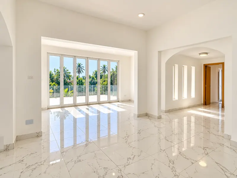 Bright interior with marble floor and full-height windows